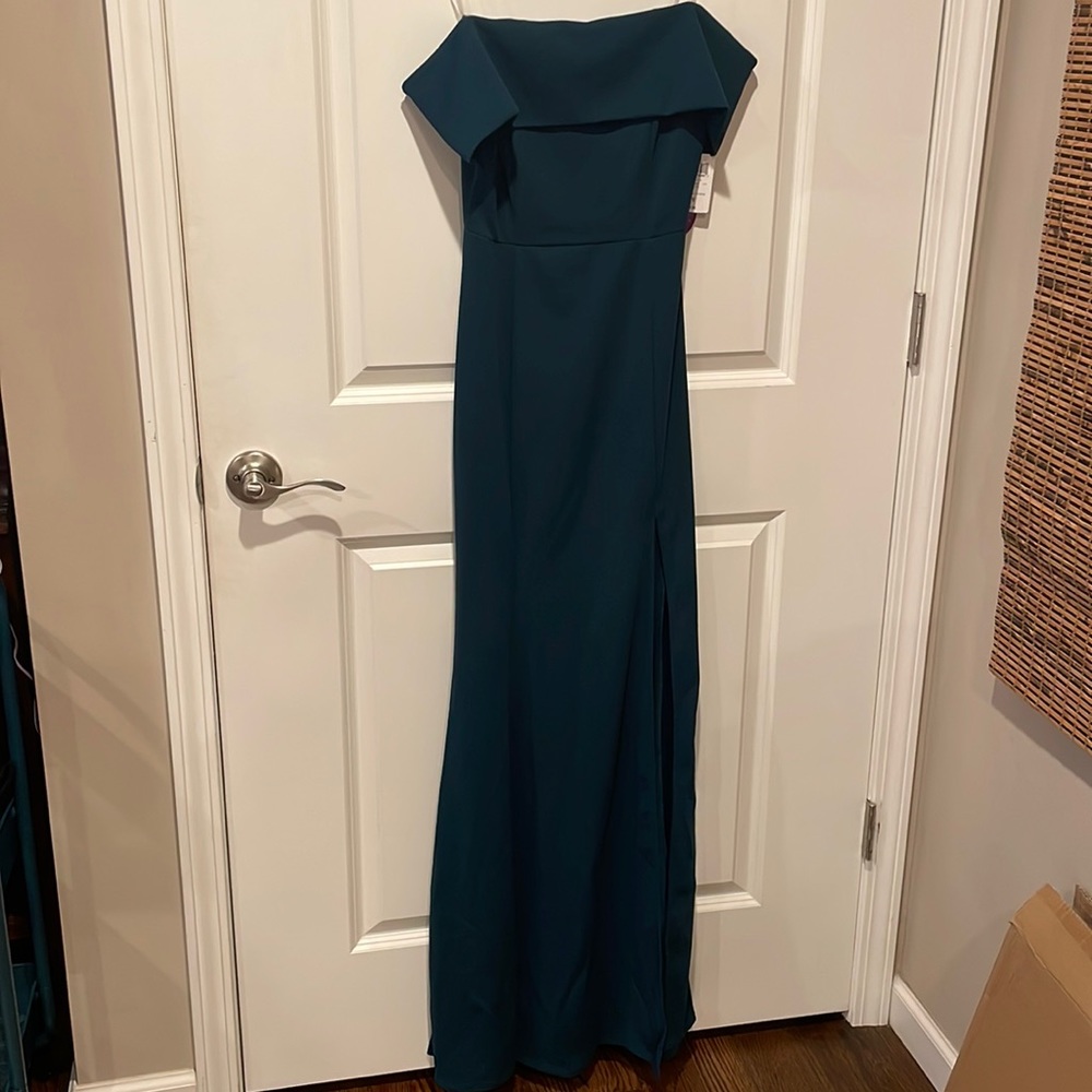 Windsor dark green floor length off the shoulder gown with slit